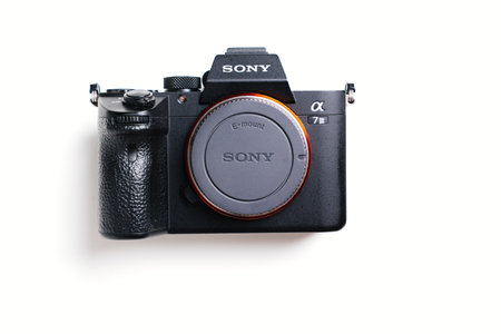 Black mirrorless Camera Sony on a white background.