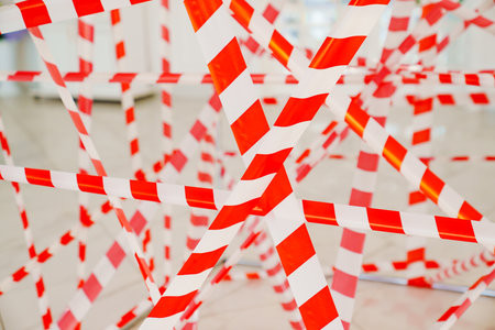 Signal Tape. the fence tape is brightly colored, with alternating stripes.の写真素材