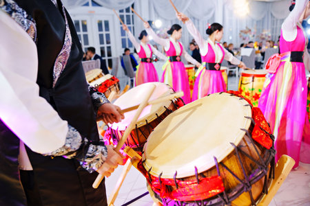actors in national Korean costumes play drums.のeditorial素材