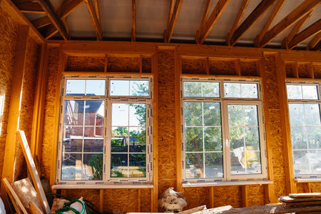 The internal structure of the block wooden house consists of wooden bars. windowの写真素材