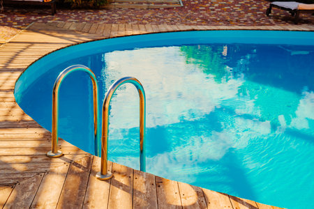 A handrail for pool stairs is an important safety feature in a swimming pool.