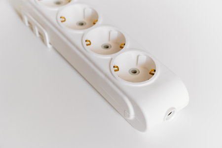 Socket pads for extension cords and surge protectors on a white background.