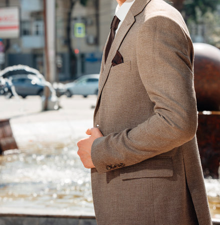 without a face. A man in a light-colored three-piece suit.の写真素材