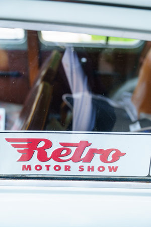 The inscription Retro motor show on the glass in the retro car.のeditorial素材