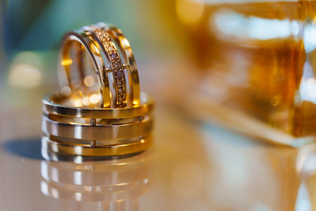Two beautiful gold wedding rings.の写真素材