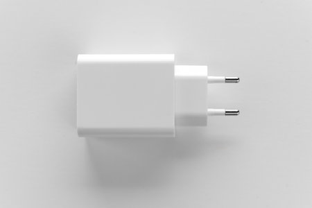 AC Charger, Adapter with USB input on a white background.
