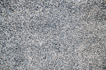 close-up dark gray Interior pile carpet made of polypropylene. Long fibers form a high pile....