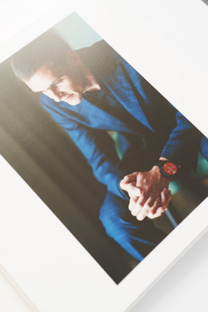 the pages of a photo book with wedding photos.の写真素材