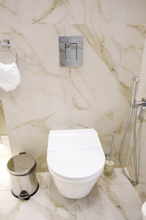 a paper strip with the inscription Sanitary safety on the toilet.の写真素材