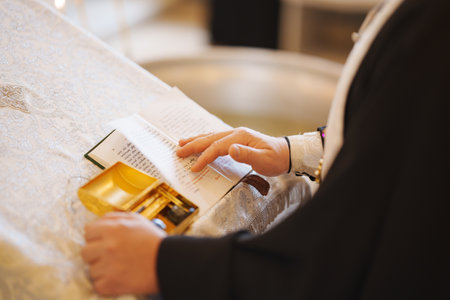 2025.07.06, Russia. Person reading a prayer at a religious ceremonyのeditorial素材