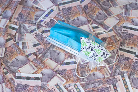 20000 Cambodia Real bills and mask for healthcareの写真素材