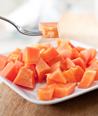 Papaya on white dishの写真素材