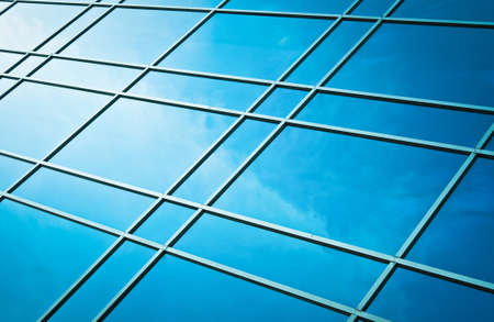 window glass reflection of cloudy sky