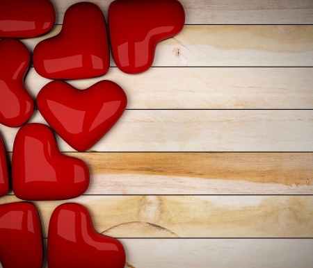 red heart on wood floor 3d rendering の写真素材