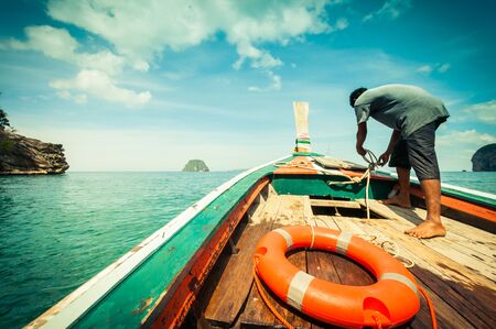 wood boat and people, business travel in Thailandの写真素材