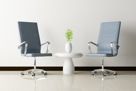 Office chair and white wall interior decoratedの写真素材