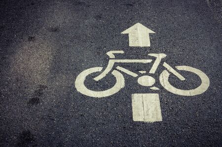 bicycle lane sign on the roadの写真素材
