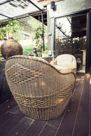 closeup of wood sofa in coffee shop, vintage style conceptionの写真素材