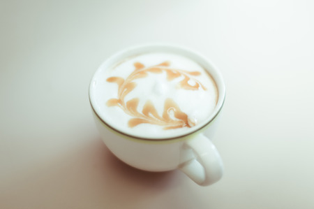 closeup of latte art coffeeの写真素材