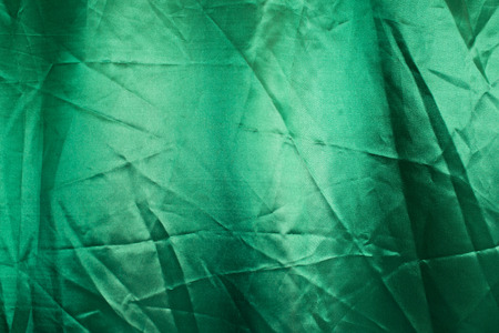 Green fabric texture backgroundの写真素材