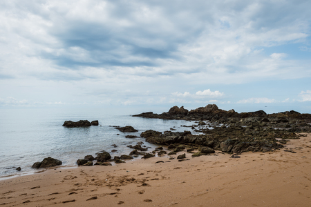 Landscape of sea beach with clouds skyの写真素材
