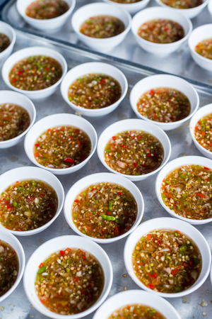 Closeup of group spicy sauce for event jobの写真素材