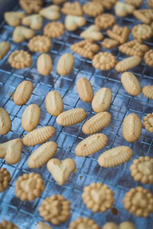 Closeup of butter cookie on a grateの写真素材