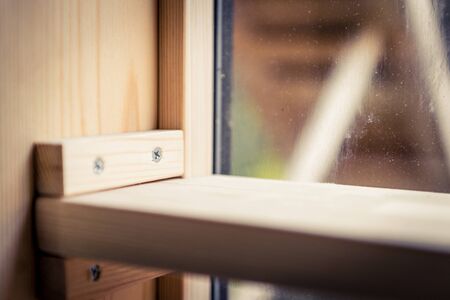 Closeup of wood shelf on the glass window designの写真素材