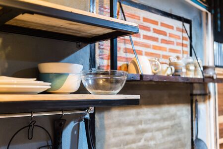 Wood shelf with bowl and ceramic cup closeupの写真素材