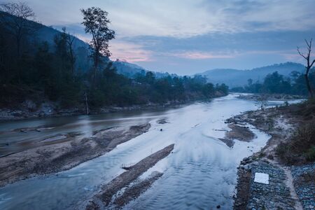 River with mountain and morning time sky landscapeの写真素材