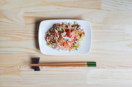 Closeup of mama yum food on wood tableの写真素材