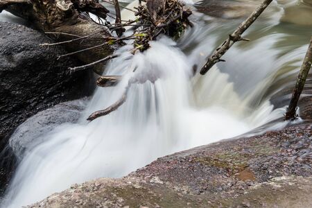 Waterfall in the forest closeupの写真素材