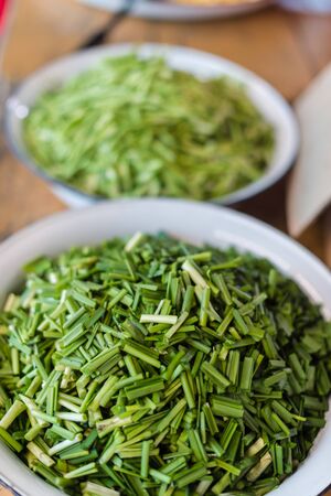 Closeup of green vegetable slice in a bowl