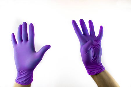 Male hand in medical glove on white background