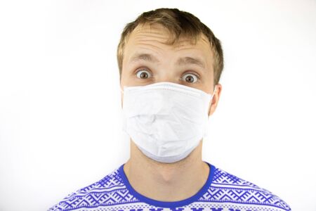 A Young guy in a medical mask.