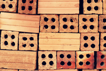 Close up of stacked clay bricks