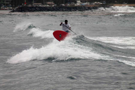Surfer riding a wave