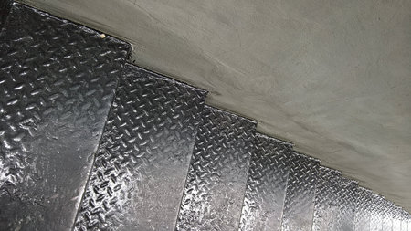 Metal Stair Steps. Metal steps used for stairs, featuring a durable and stable construction.の写真素材
