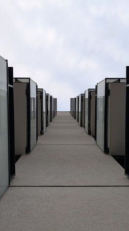 A view of a modern building design. Looking up at the sleek facade of a modern building, showcasing rows of glass panels against a cloudy sky.の写真素材