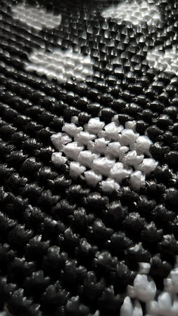 Intricate Black and White Woven Surface Detail