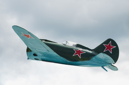Soviet fighter aircraft I-16 is flying against cloudy skyのeditorial素材