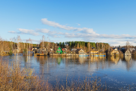 Natural disaster. Houses that were flooded as a result of spring floodsの写真素材