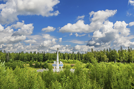 SVERDLOVSK OBLAST , RUSSIA - JULY 12, 2016: The monument on the border of Europe and Asia on a Sunny summer dayの写真素材