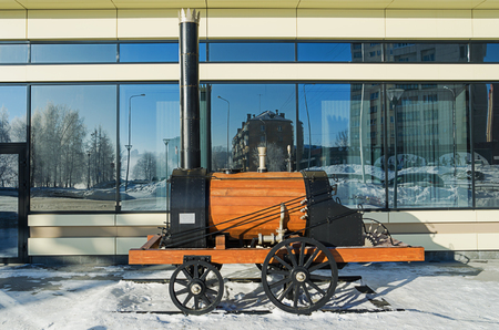 NIZHNY TAGIL, RUSSIA - FEBRUARY 13, 2016: The layout of the first Russian steam locomotive, mounted near the hotel Park Inn in Nizhny Tagilのeditorial素材