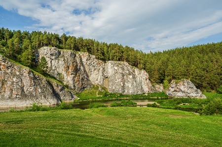 Summer landscape. Rocks on the Bank of the river Rezh near the village of Aramashevo Alapaevsky districtの写真素材