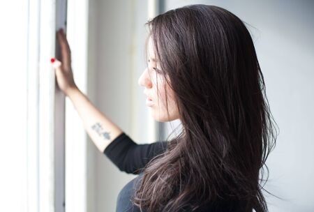 portrait of young beautiful brown hair womanの写真素材
