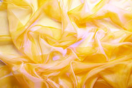 background from a fabric with folds, highlighted sidewaysの写真素材