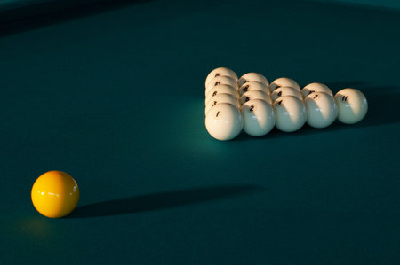 Billiard balls on green cloth - start of the game.の写真素材