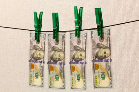 Money laundering. Laundering of money. The concept of laundering corruption criminal money. Hundred...