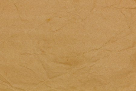 Beige paper texture. Abstract background. Smooth brown wrapping kraft paper. Copy space for textの写真素材
